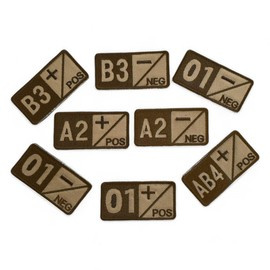 BLOOD GROUP badge A+ embroidered on beige backing with brown thread - hook and loop application - 7 x 3,5 cm