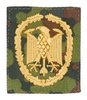 PATCH GENUINE GERMAN ACHIEVEMENT BADGE GOLD ON FLECKTARN CAMO FABRIC 55 x 45 MM